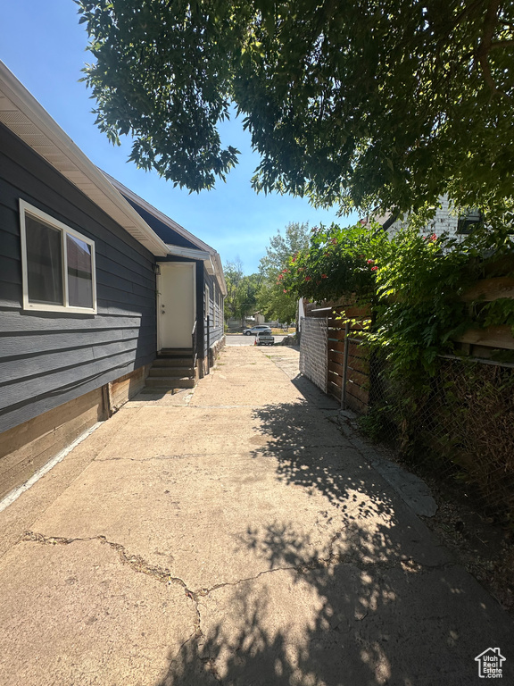 View of property exterior featuring entry steps