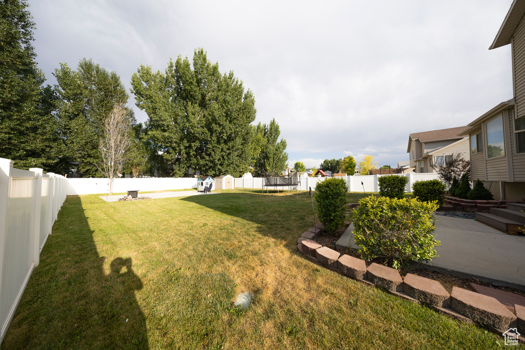 View of fenced backyard