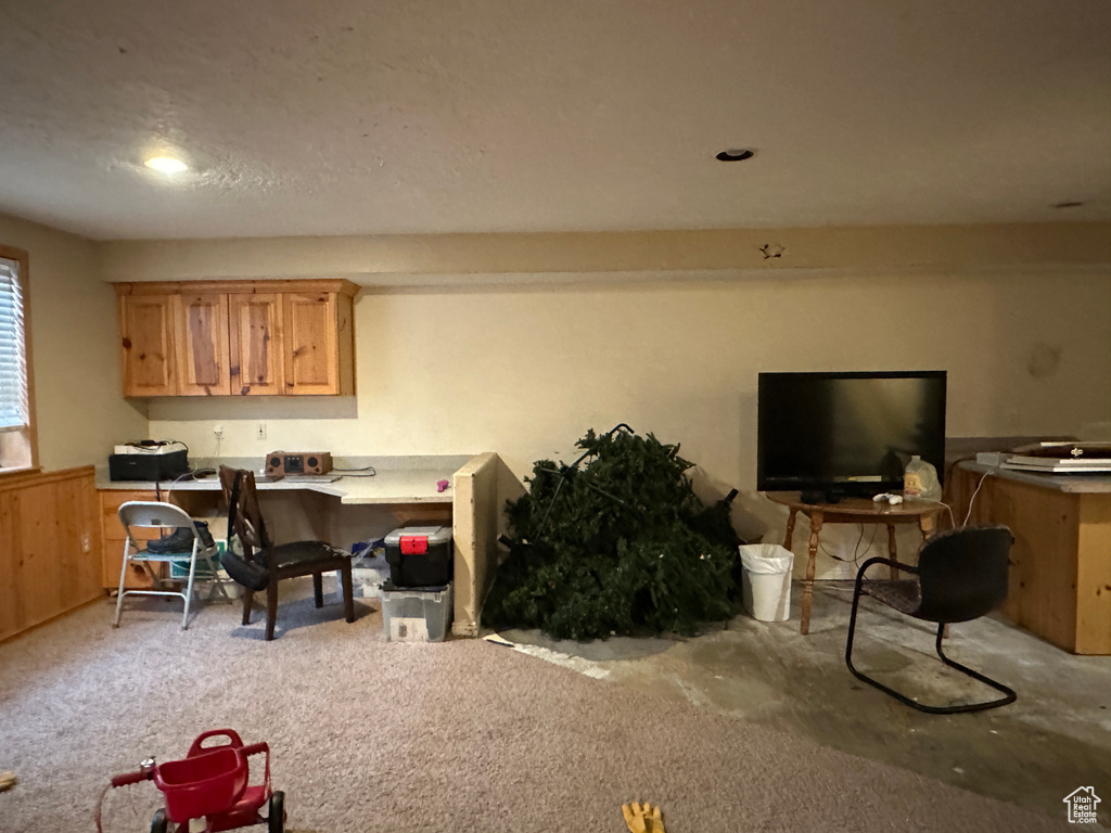 Office area featuring carpet flooring