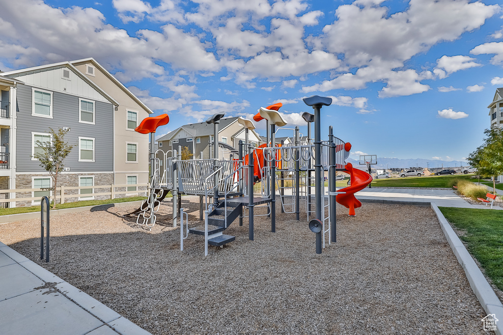 Community playground featuring a residential view