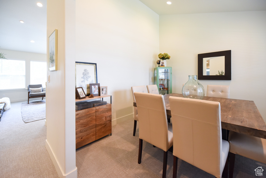 Dining room featuring carpet and recessed lighting