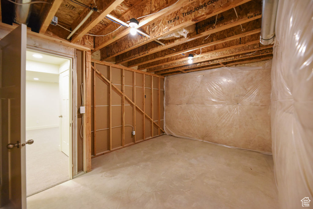 Unfinished basement with recessed lighting