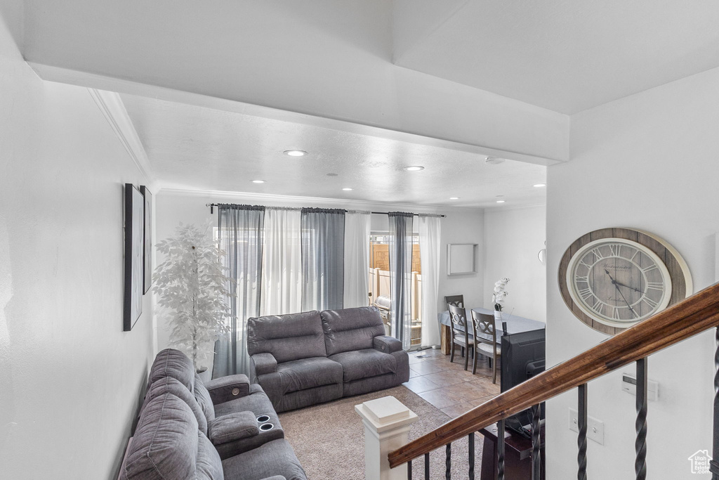 Carpeted living room featuring recessed lighting