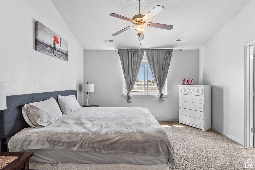 Bedroom with carpet flooring and ceiling fan
