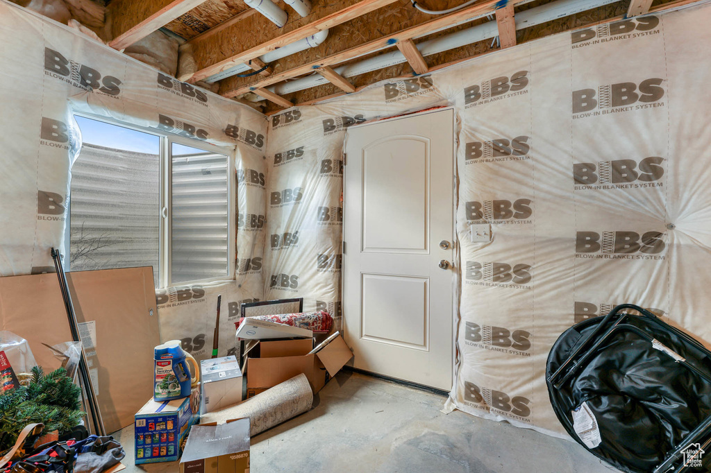 Miscellaneous room featuring concrete floors