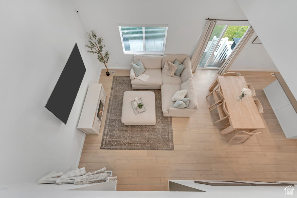 Living room with wood finished floors and baseboards