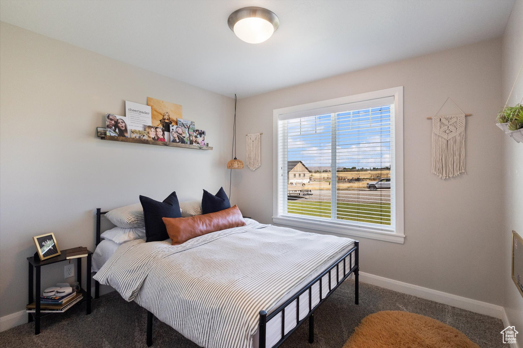 Bedroom featuring carpet flooring