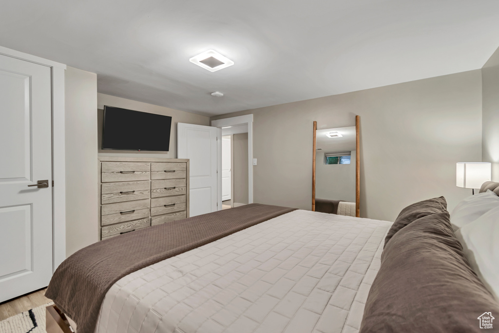 Bedroom with light wood-style flooring