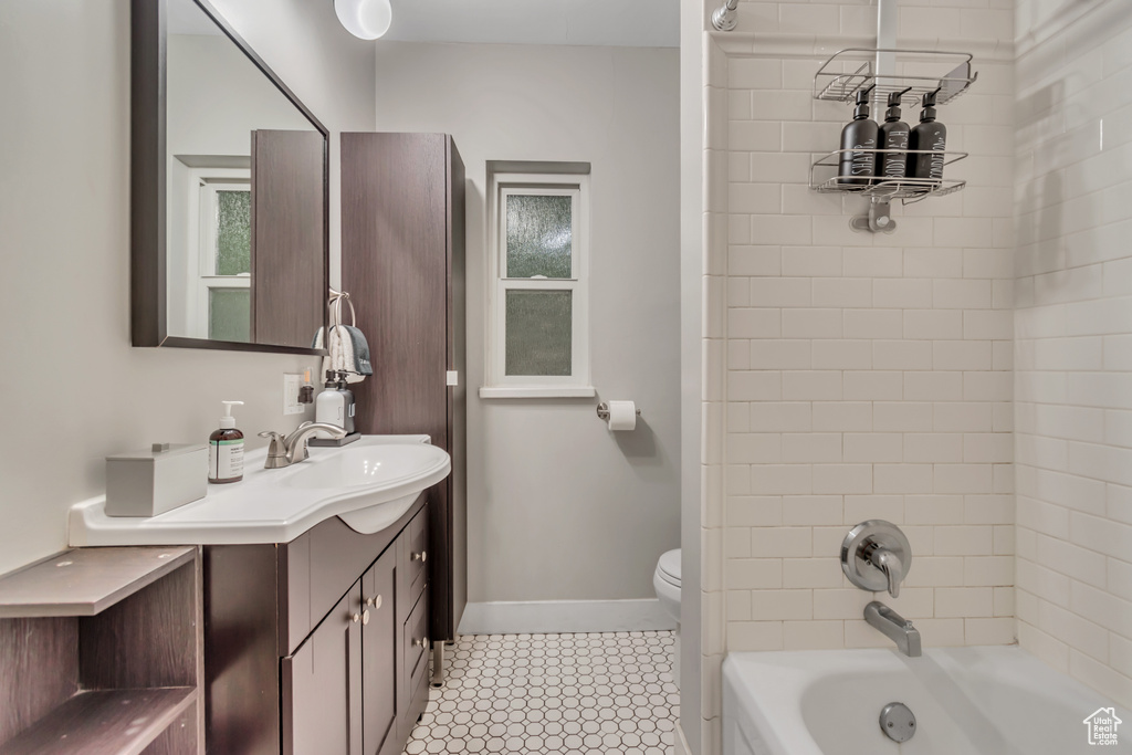 Full bathroom featuring vanity and shower / bath combination