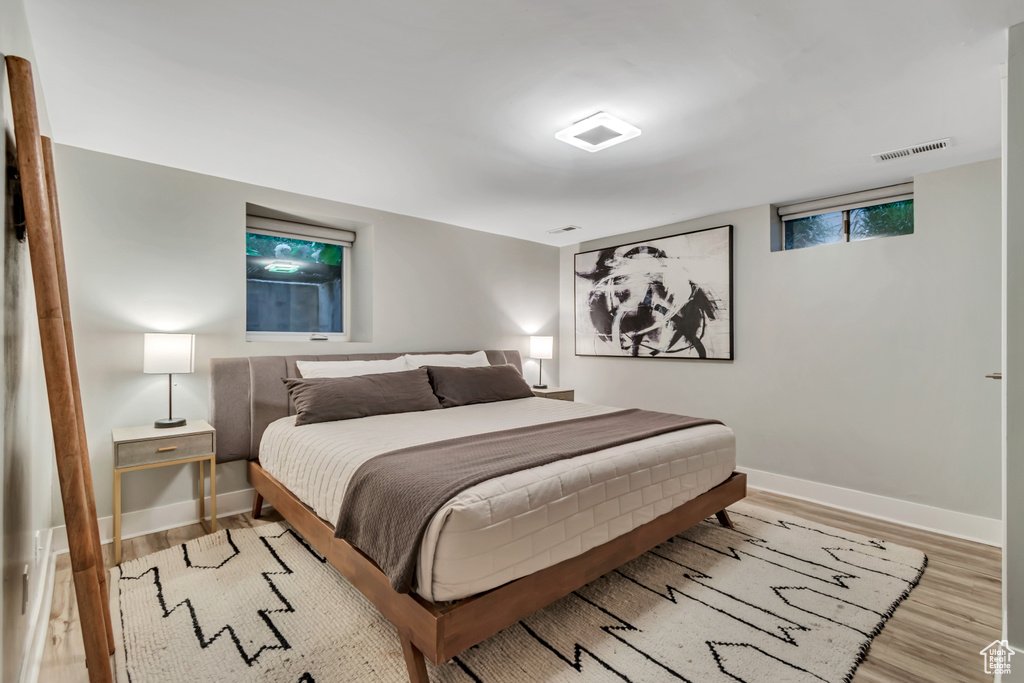 Bedroom featuring wood finished floors