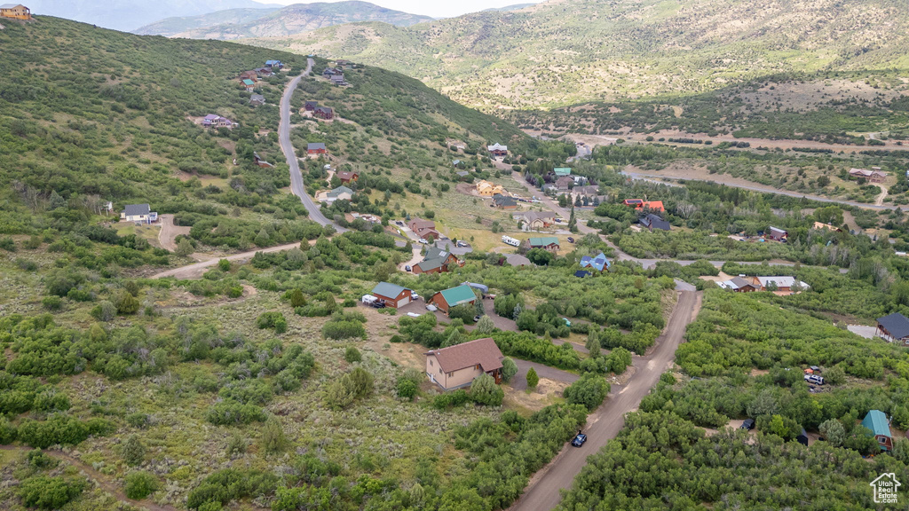 Aerial overview of property's location featuring mountains