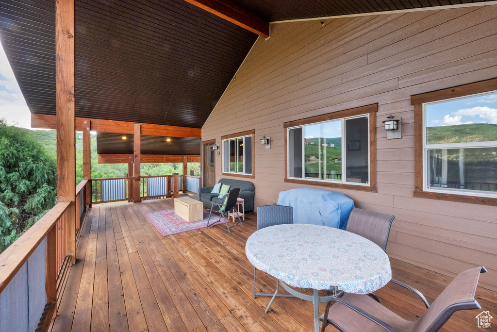 Deck with an outdoor living space