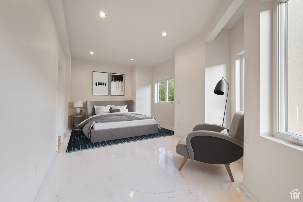 Bedroom featuring recessed lighting and marble tiled flooring
