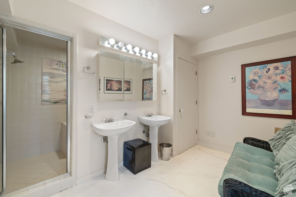 Full bath with a stall shower and recessed lighting