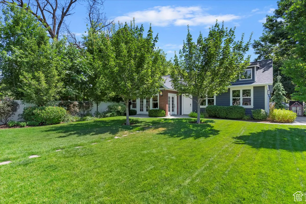 Obstructed view of property featuring french doors
