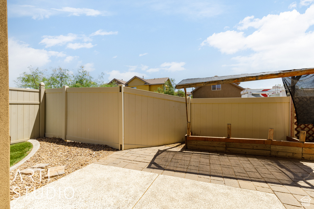 View of patio / terrace featuring a gate