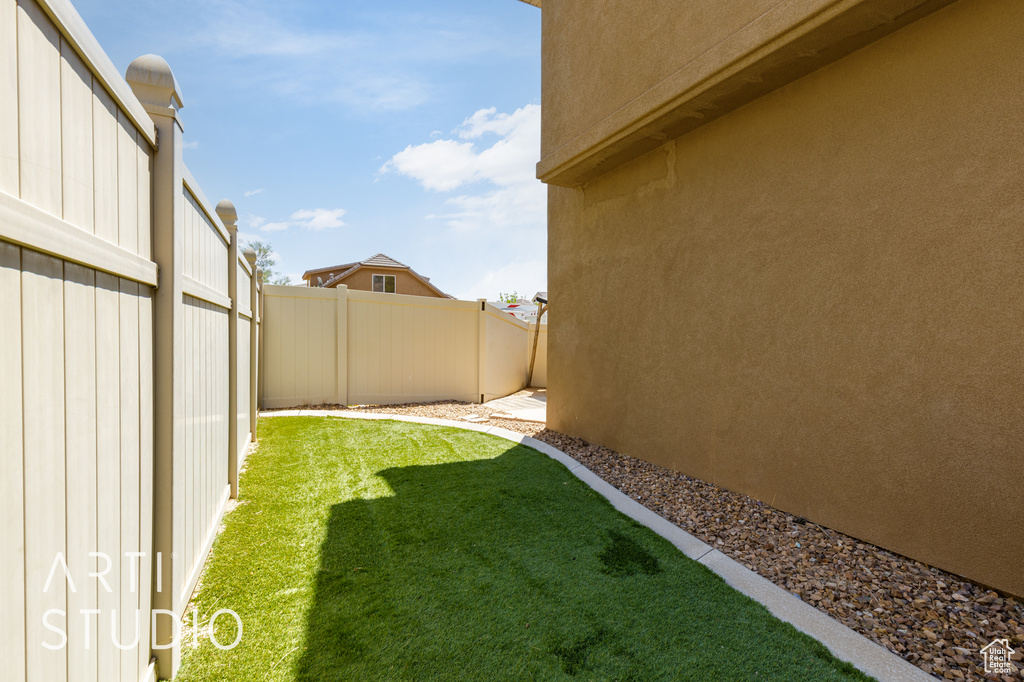 View of fenced backyard