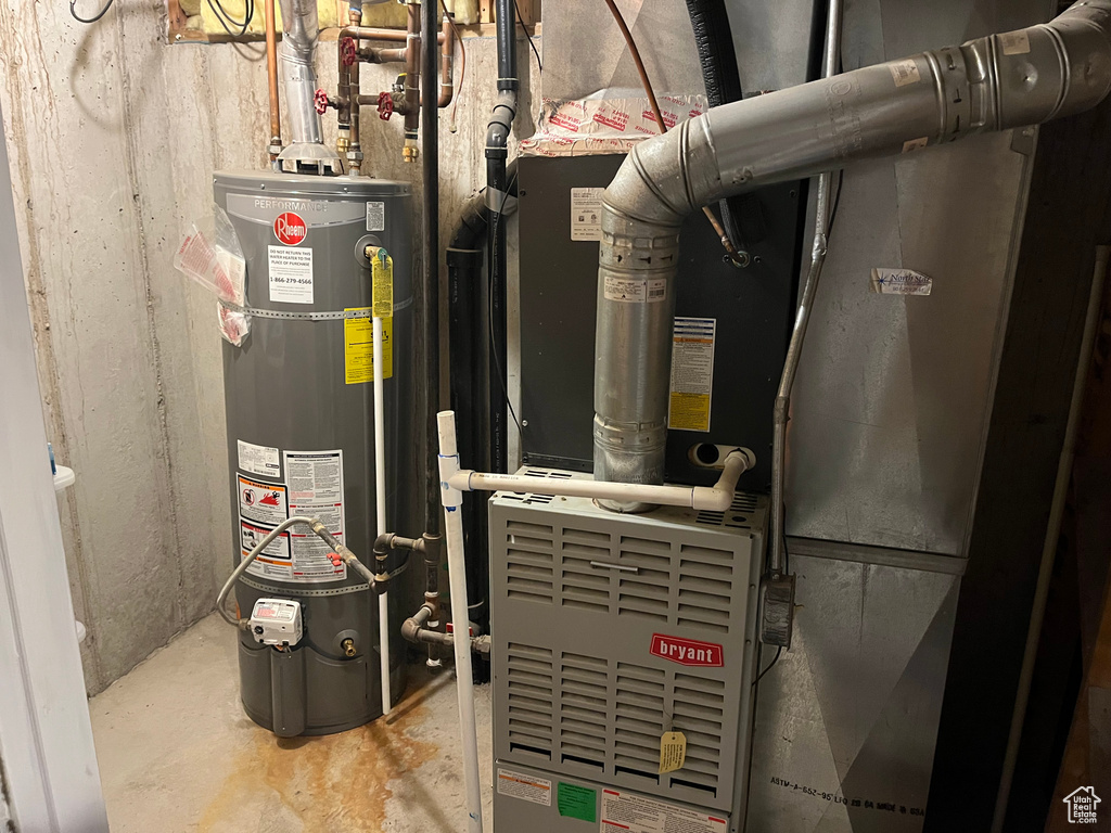Utilities with strapped water heater and heating unit