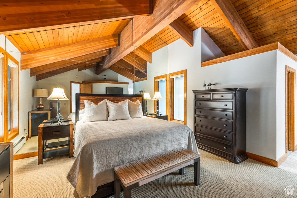 Bedroom with light carpet, baseboard heating, and wood ceiling