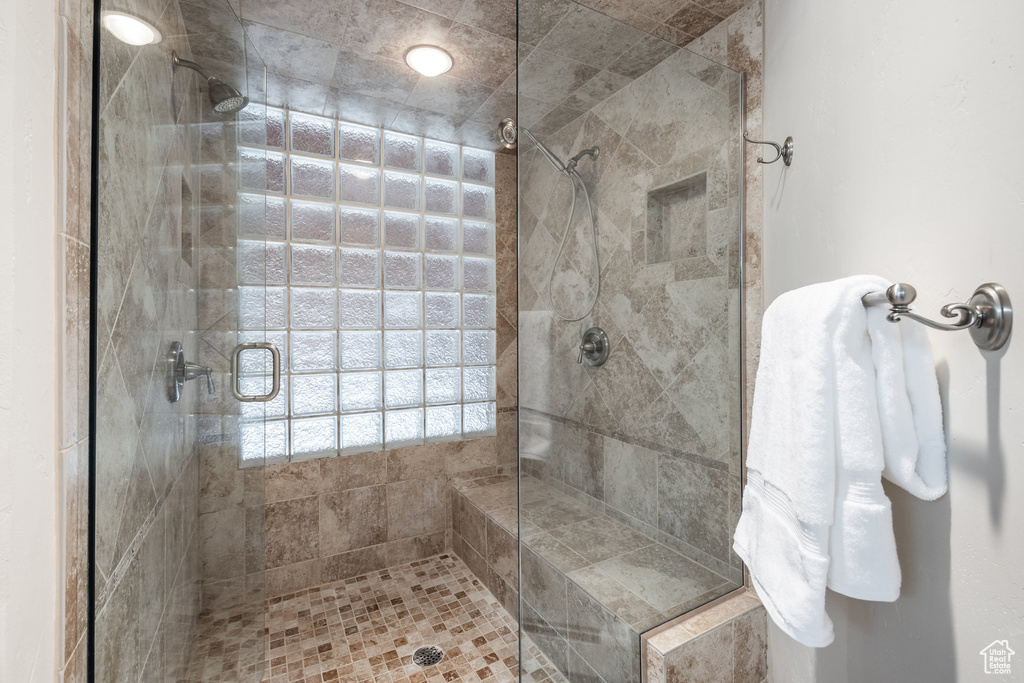 Full bathroom featuring a stall shower