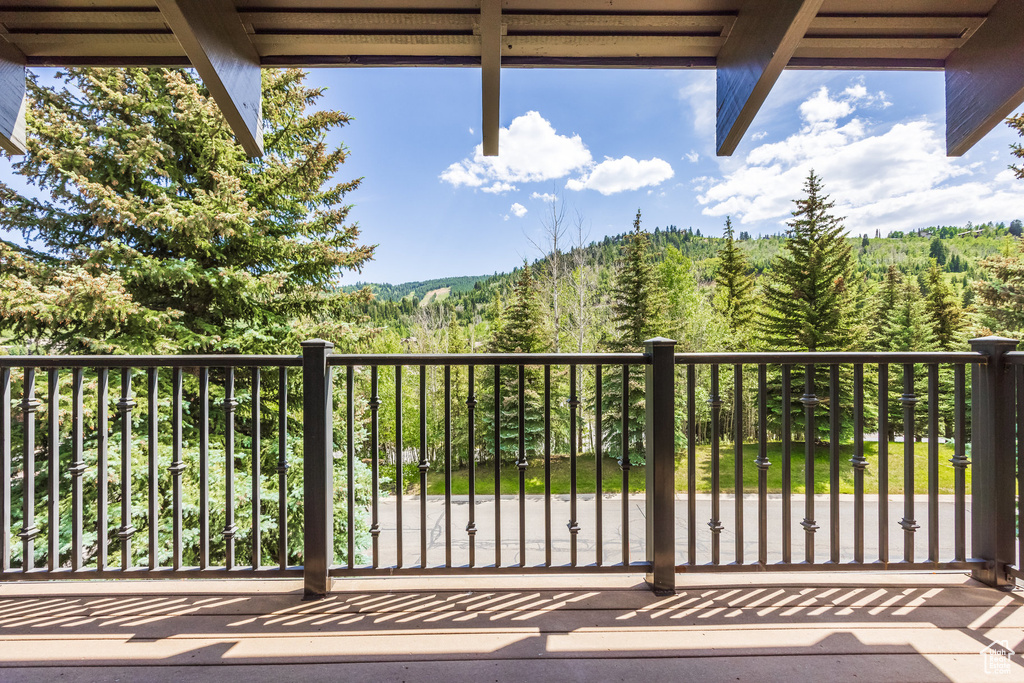 Balcony with a wooded view