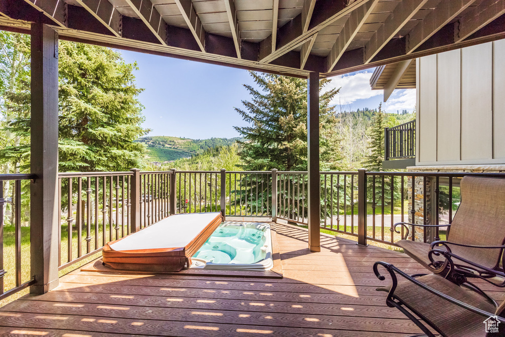 Deck featuring a forest view