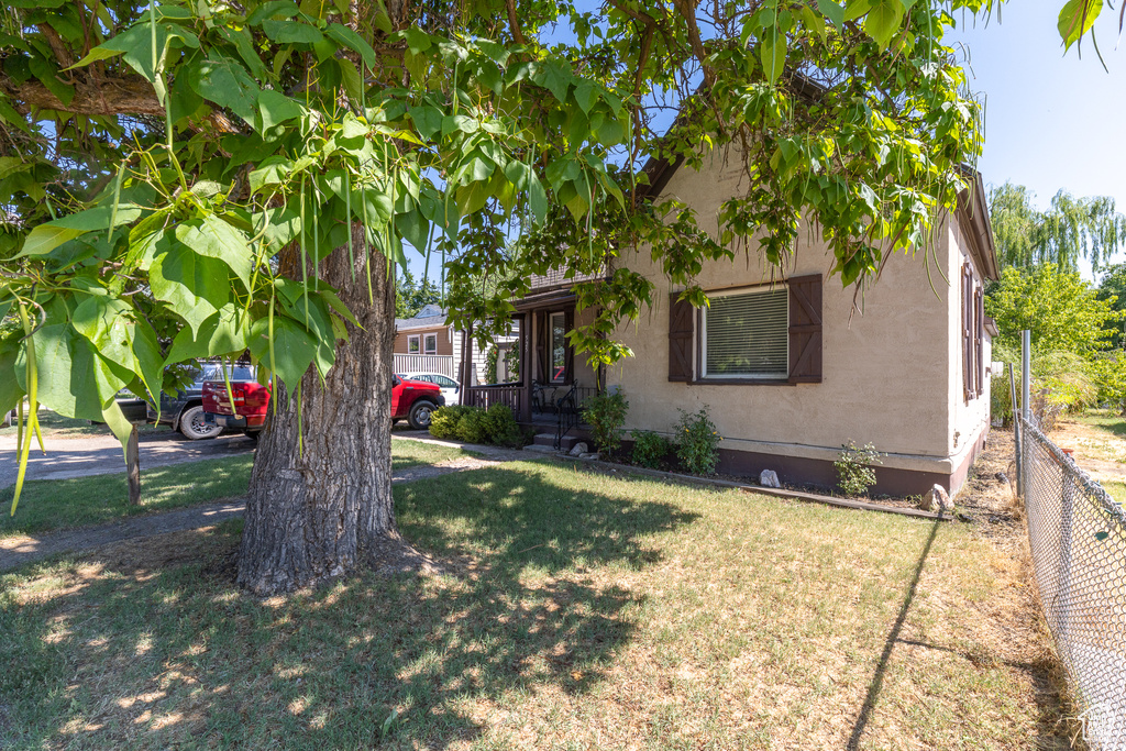 View of property exterior with stucco siding