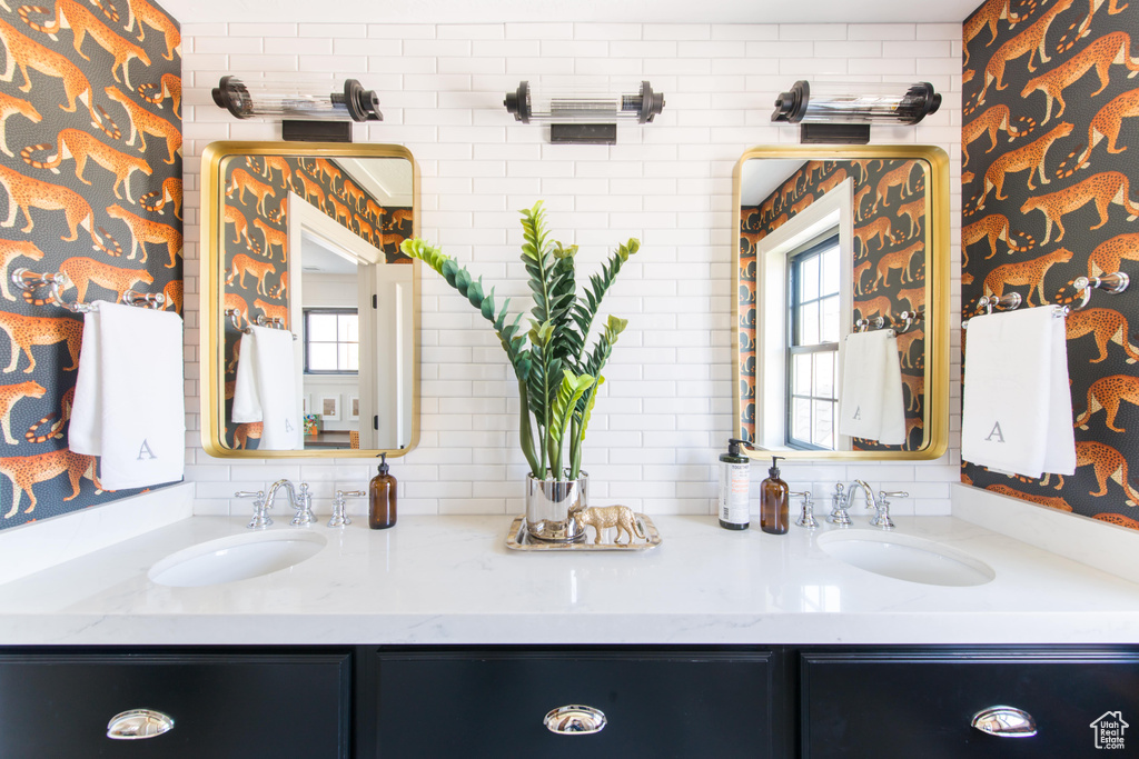 Full bathroom with double vanity