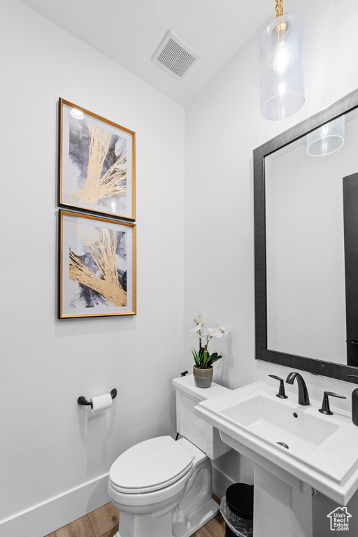 Bathroom with wood finished floors