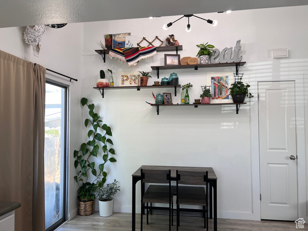 Detailed view of wood finished floors and baseboards