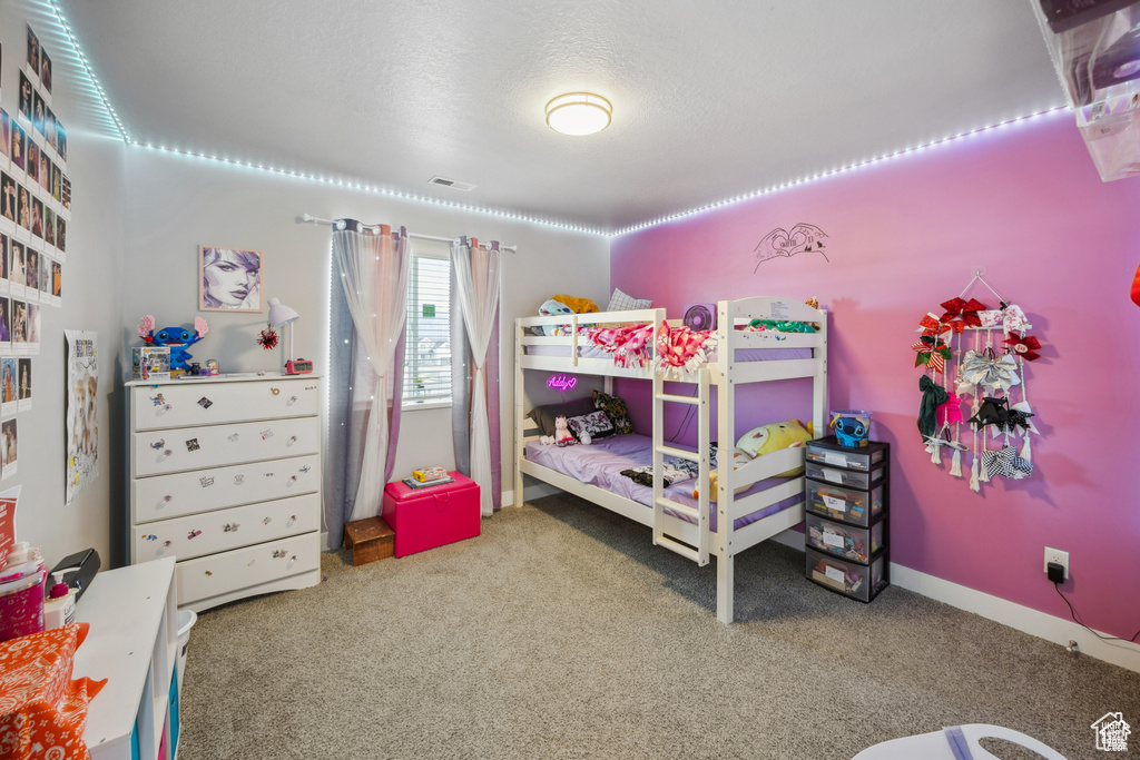 Bedroom featuring carpet flooring