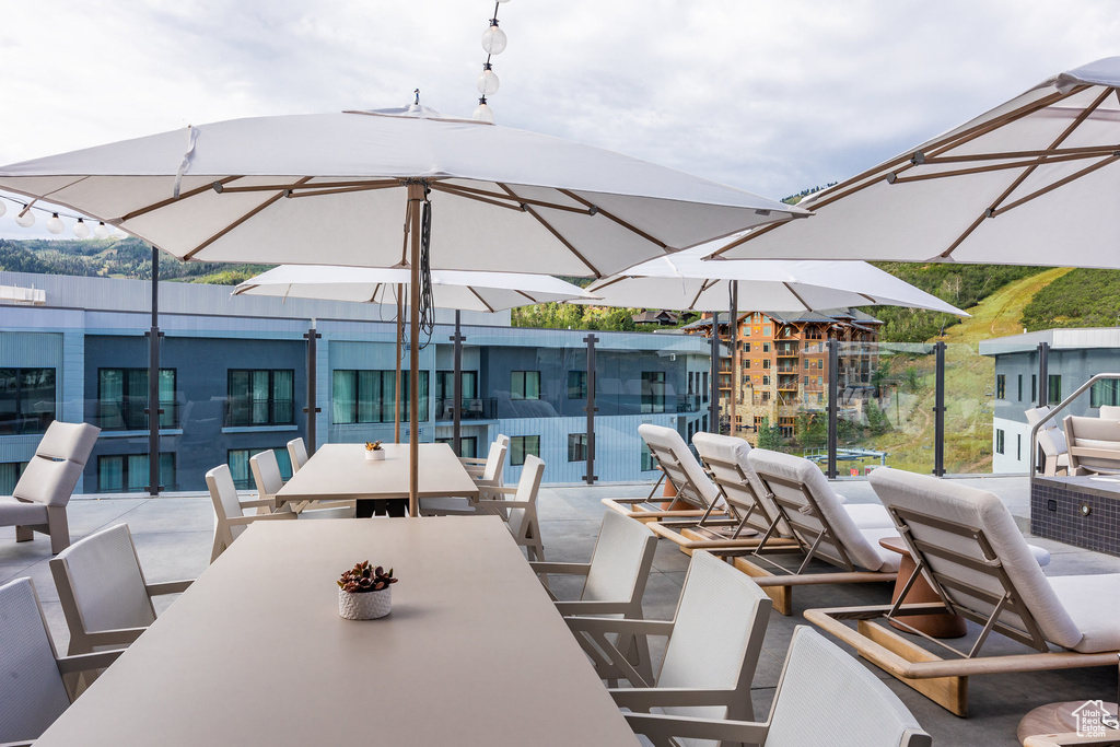 View of patio featuring outdoor dining area