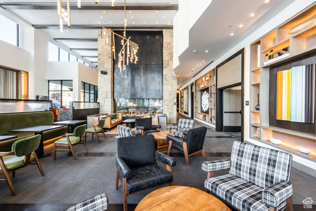 Building lobby featuring a high ceiling and recessed lighting