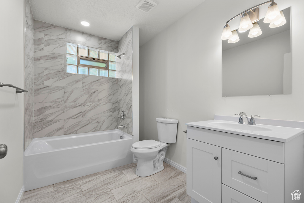 Full bathroom featuring vanity and shower / bathtub combination
