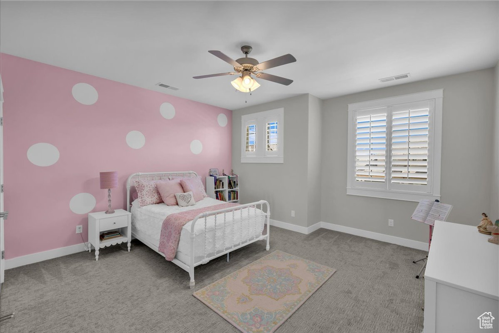 Bedroom with carpet and ceiling fan