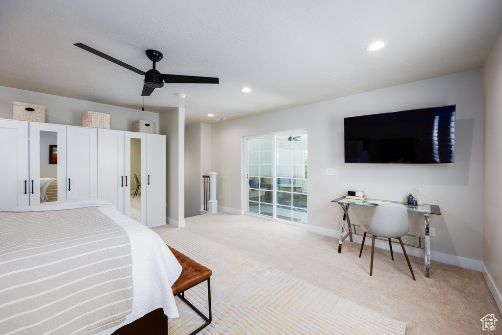 Bedroom featuring light carpet, recessed lighting, a ceiling fan, and an office area