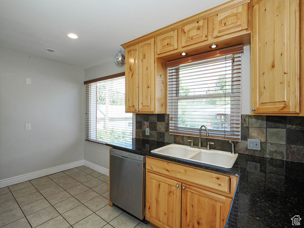 Kitchen with dishwasher, decorative backsplash, light brown cabinets, light tile patterned flooring, and recessed lighting