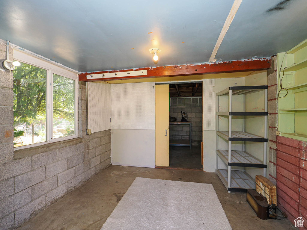 Below grade area featuring a wood stove