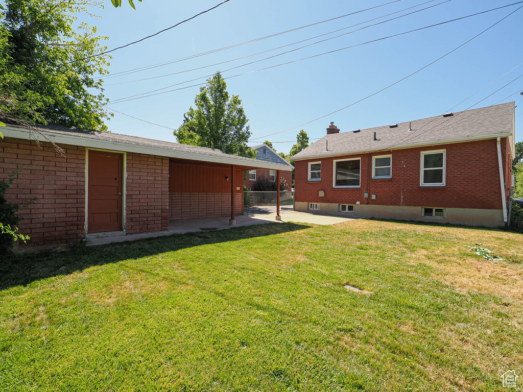 View of yard with a patio