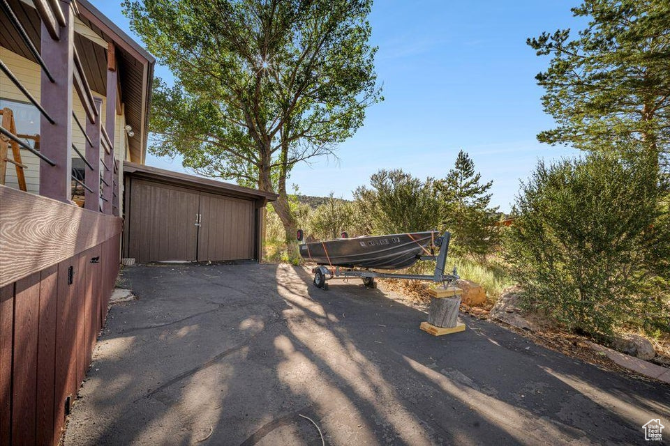 View of patio featuring a garage