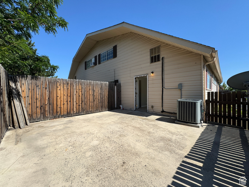 Rear view of property featuring a patio