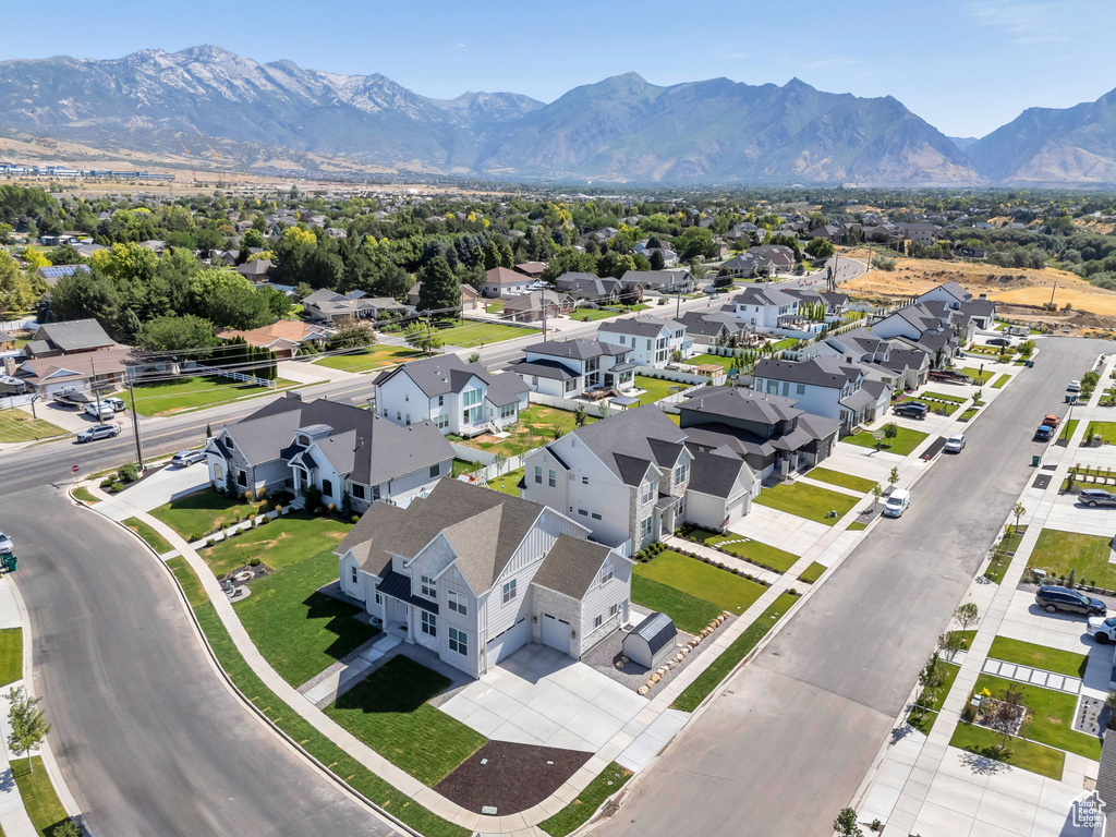 Aerial perspective of suburban area with mountains