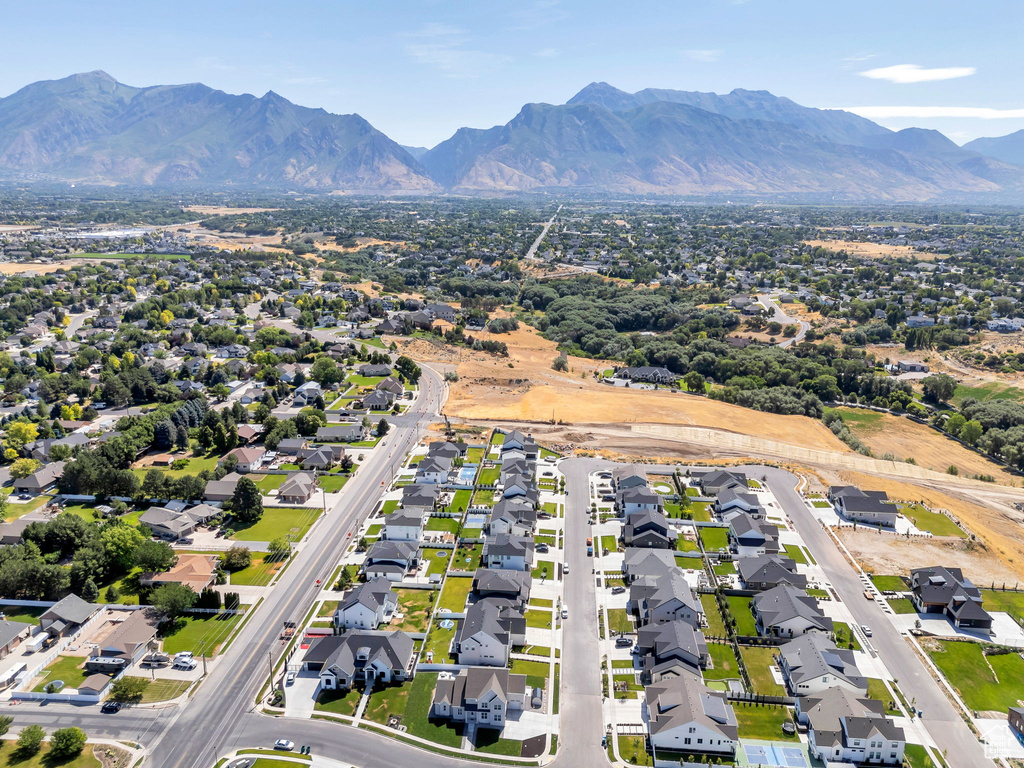 Aerial view of residential area with a mountainous background