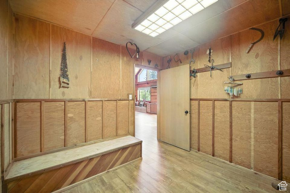 Hallway with wood finished floors