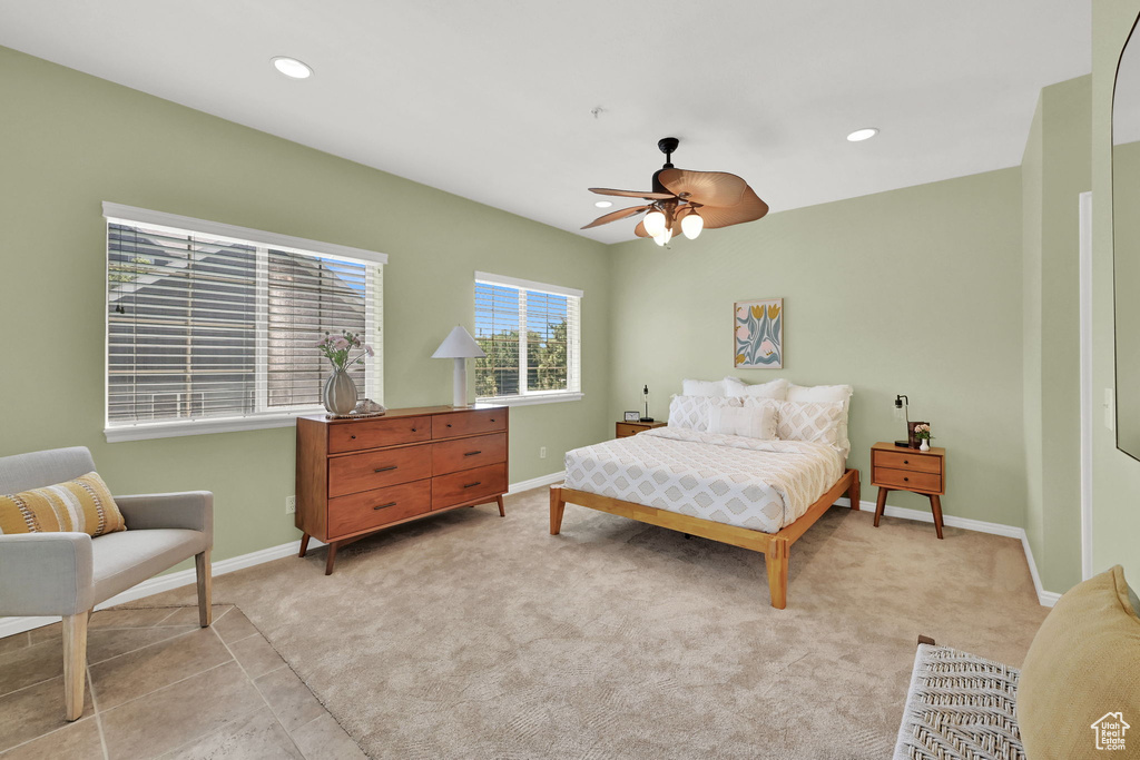 Bedroom with recessed lighting, light carpet, and a ceiling fan