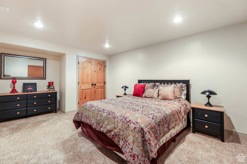 Bedroom with carpet floors and recessed lighting