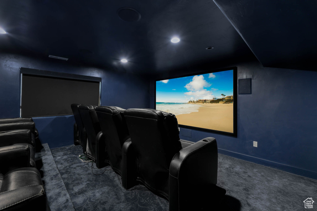 Cinema room with carpet flooring and recessed lighting