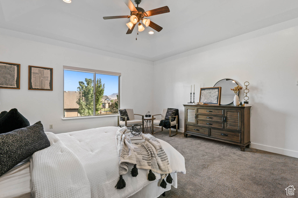 Carpeted bedroom featuring recessed lighting and ceiling fan