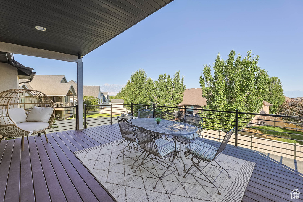Wooden terrace with outdoor dining space