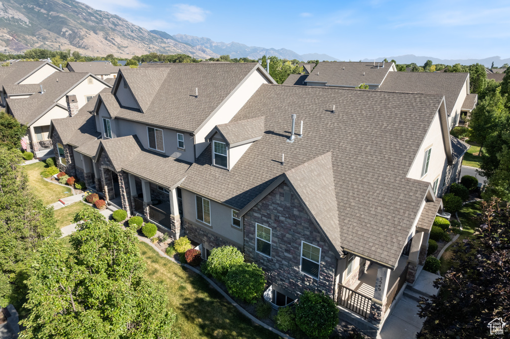 Aerial view of residential area with a mountain backdrop